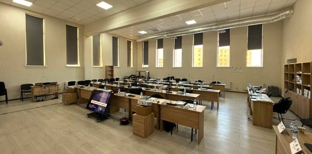 Conference event in the Balkans with delegates and stage setup